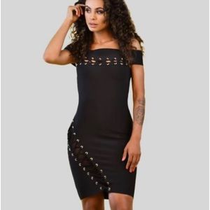 Black cutout mini dress .  Never worn with tags